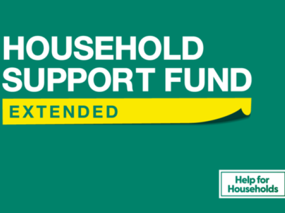 Green background with the words Household Support Fund Extended