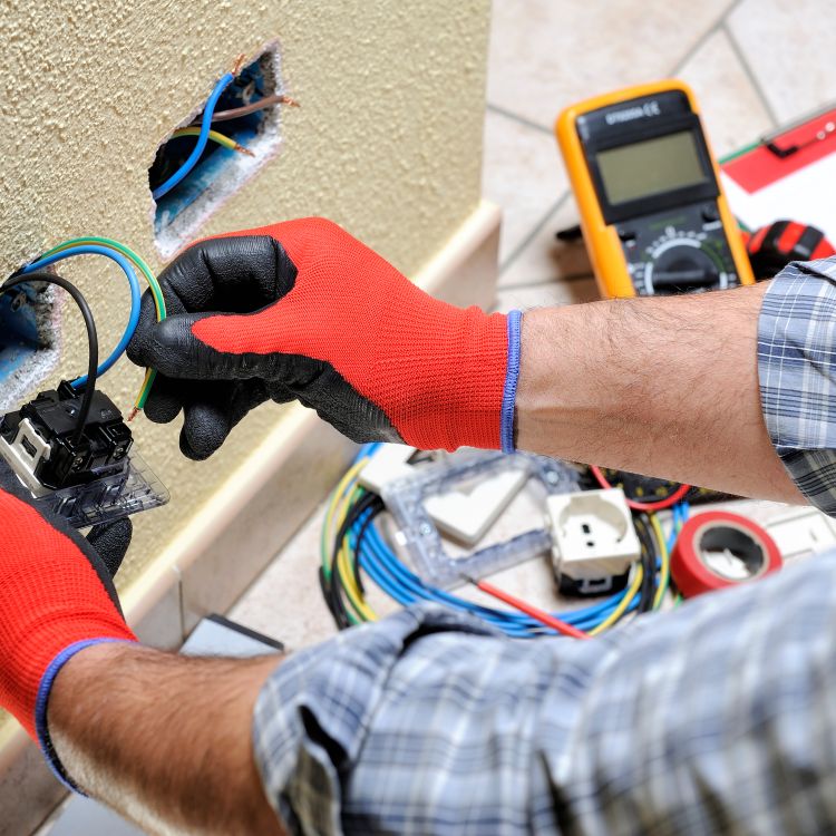 Electrician working on a socket