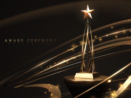 Gold Award Trophy on a black background