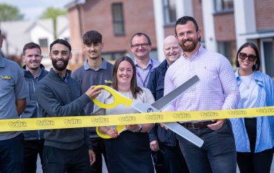 The teams at Platform Housing Group and E G Carter & Co Limited cutting the ribbon at the official opening of the Middleton Avenue housing development 